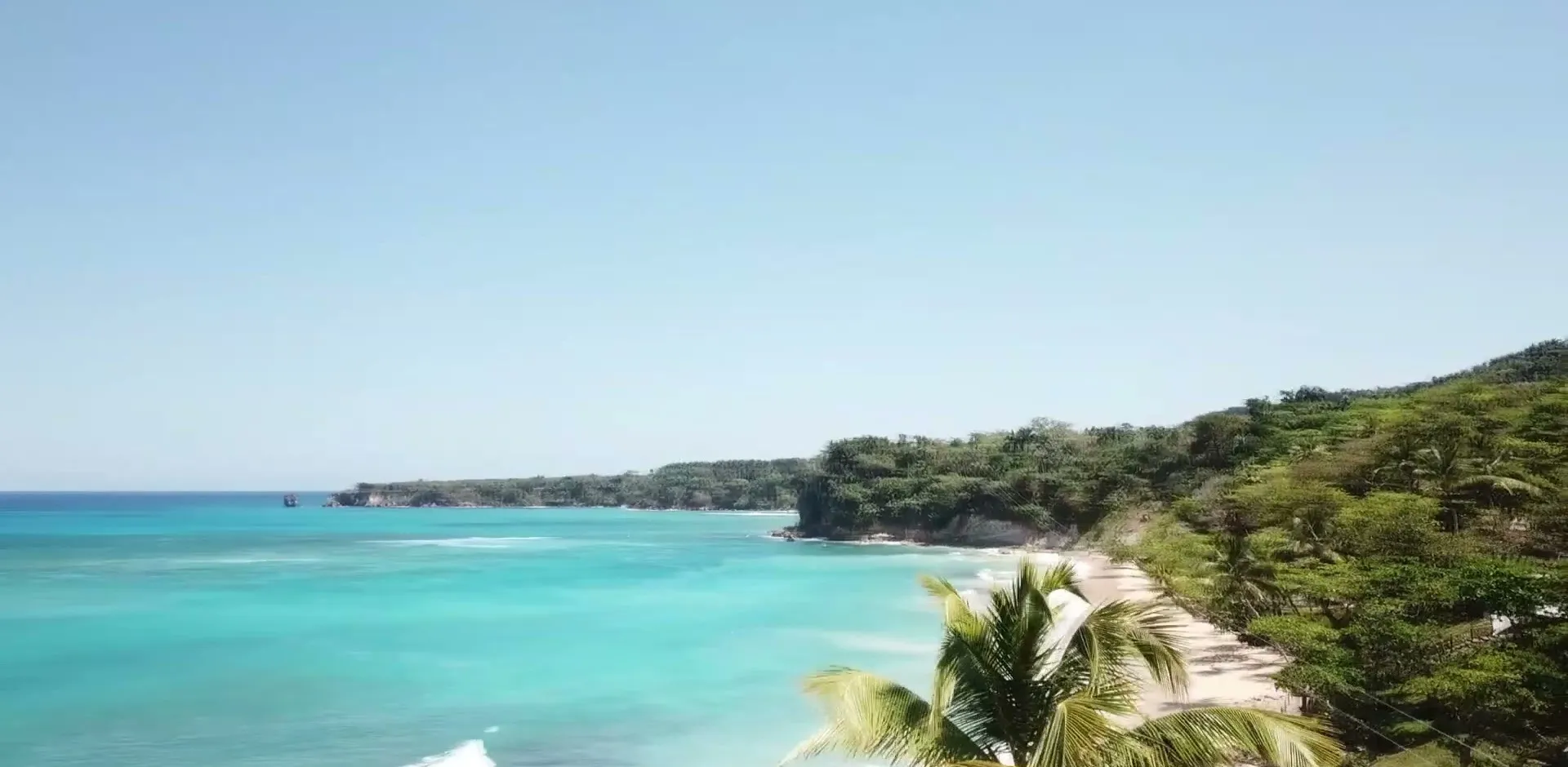 Río San Juan turquoise bay and coastline, aerial drone view